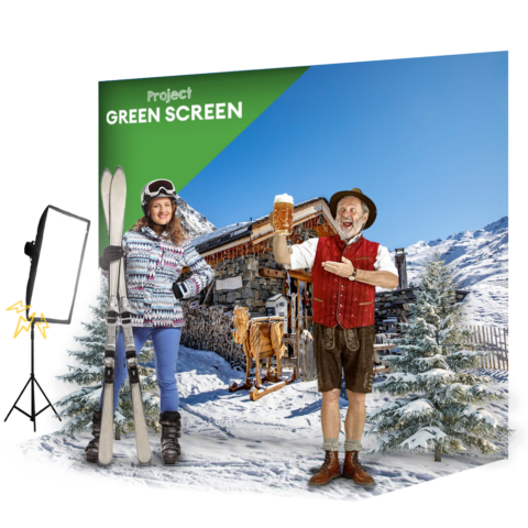 Man en vrouw staan in de sneeuw met een green screen photobooth